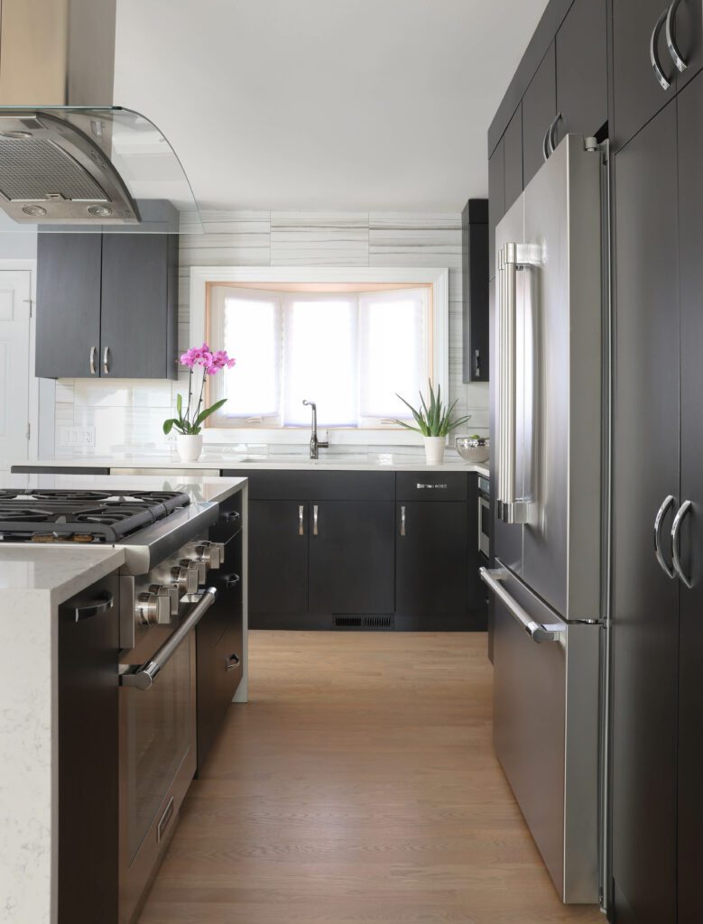 Modern kitchen with black slab cabinets