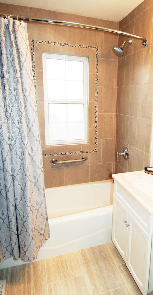 hall bathroom with shower tub combo and shower curtain