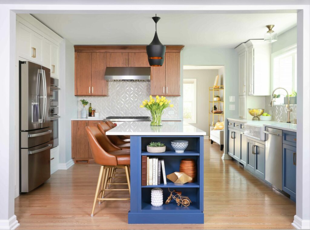 kitchen with blue, white and walnut cabinets