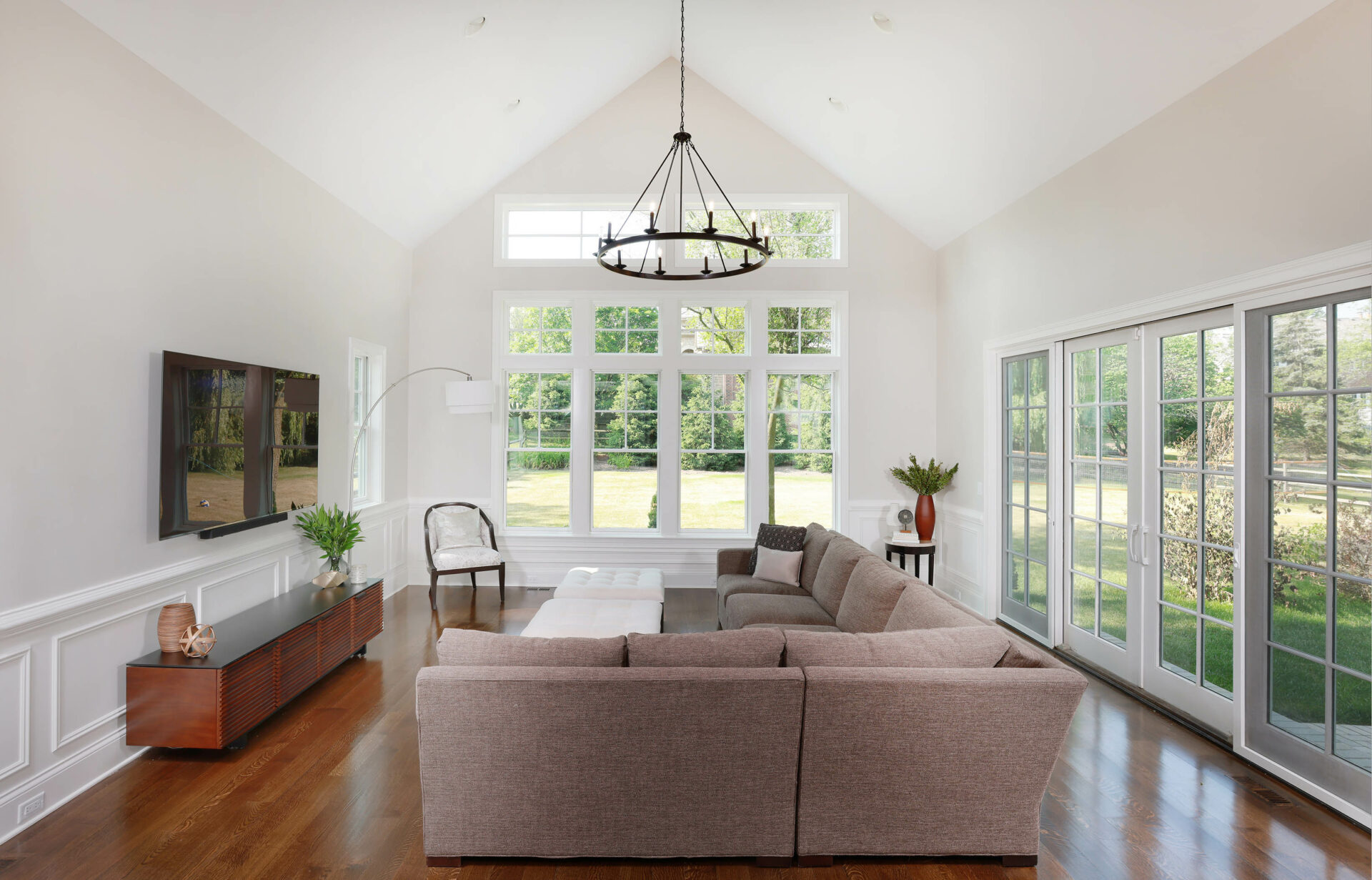 interior view of a family room addition with a vaulted ceiling