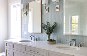 Bathroom vanities with blue backsplash tile