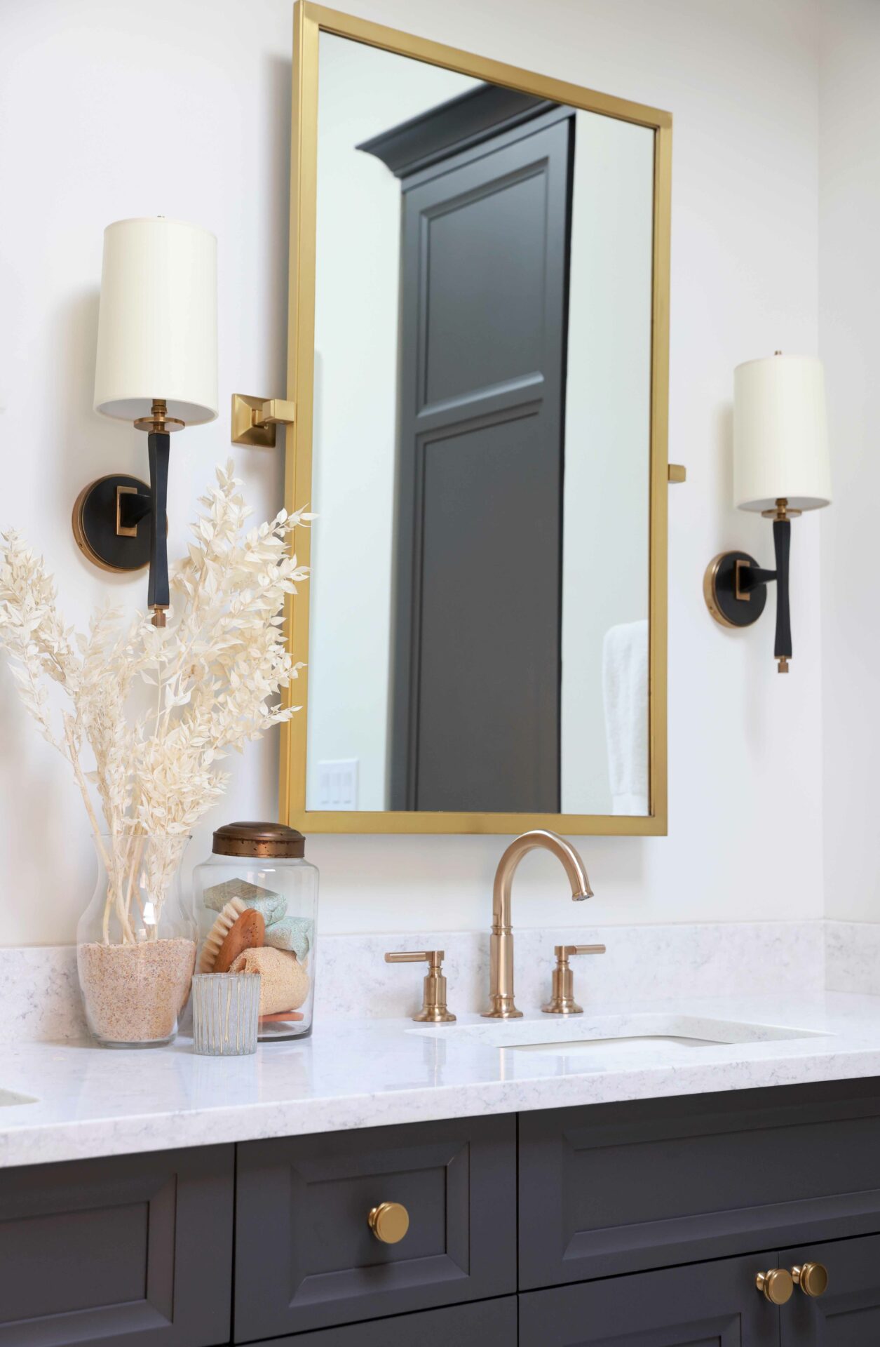 Bathroom vanity with faucet and mirror