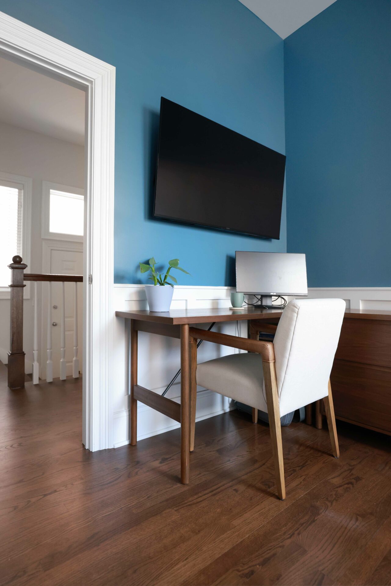 home office with bright blue wall