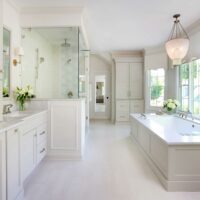 master bathroom with separate bathtub and shower