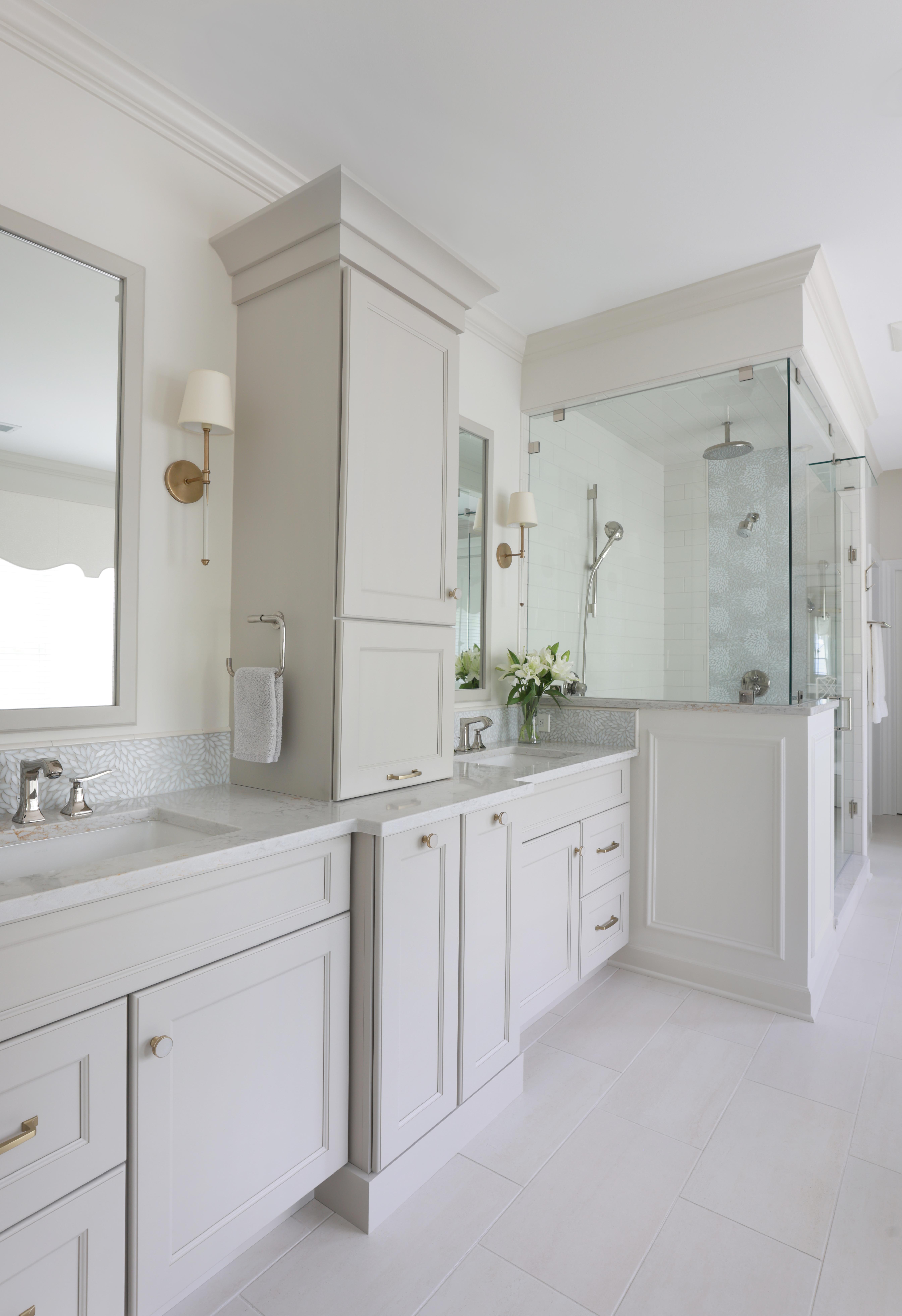 gray bathroom with separate shower and double vanities