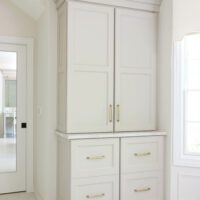bathroom storage cabinets with hidden hampers