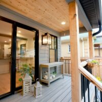 Modern farmhouse style porch with beadboard ceiling