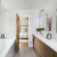 Home addition created a new primary bathroom and bedroom