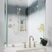 Separate shower and bathtub with decorative mosaic tile