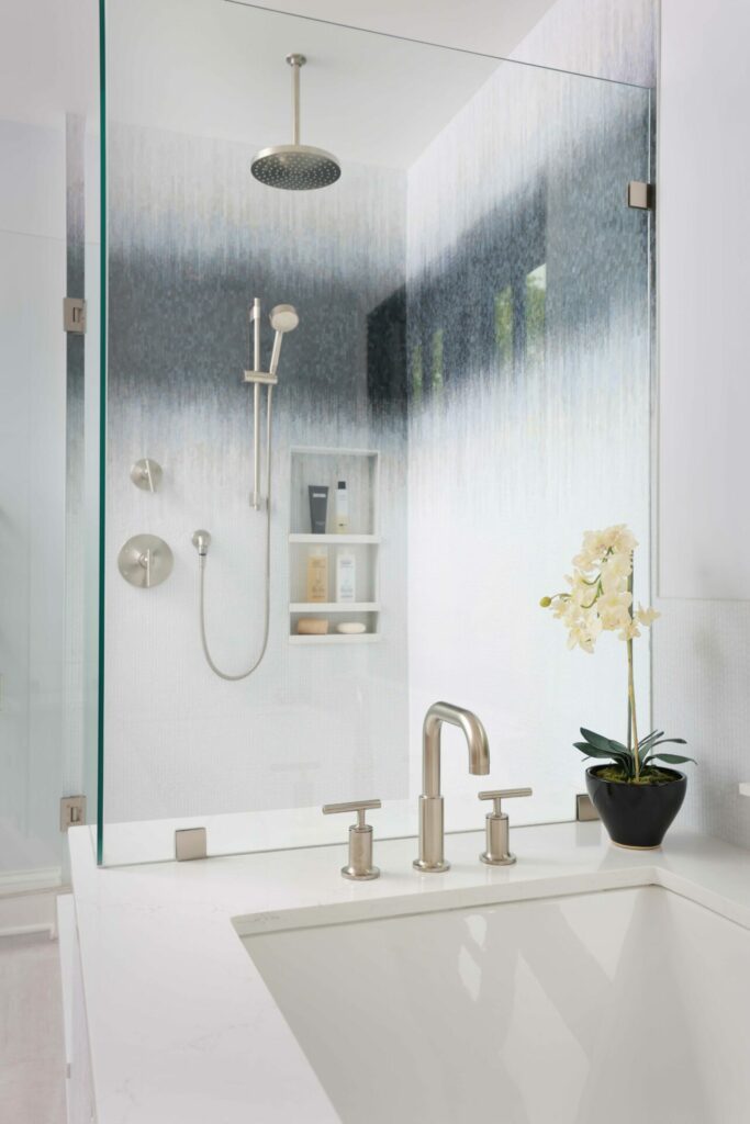 Separate shower and bathtub with decorative mosaic tile