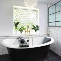 Freestanding bathtub with underside painted black