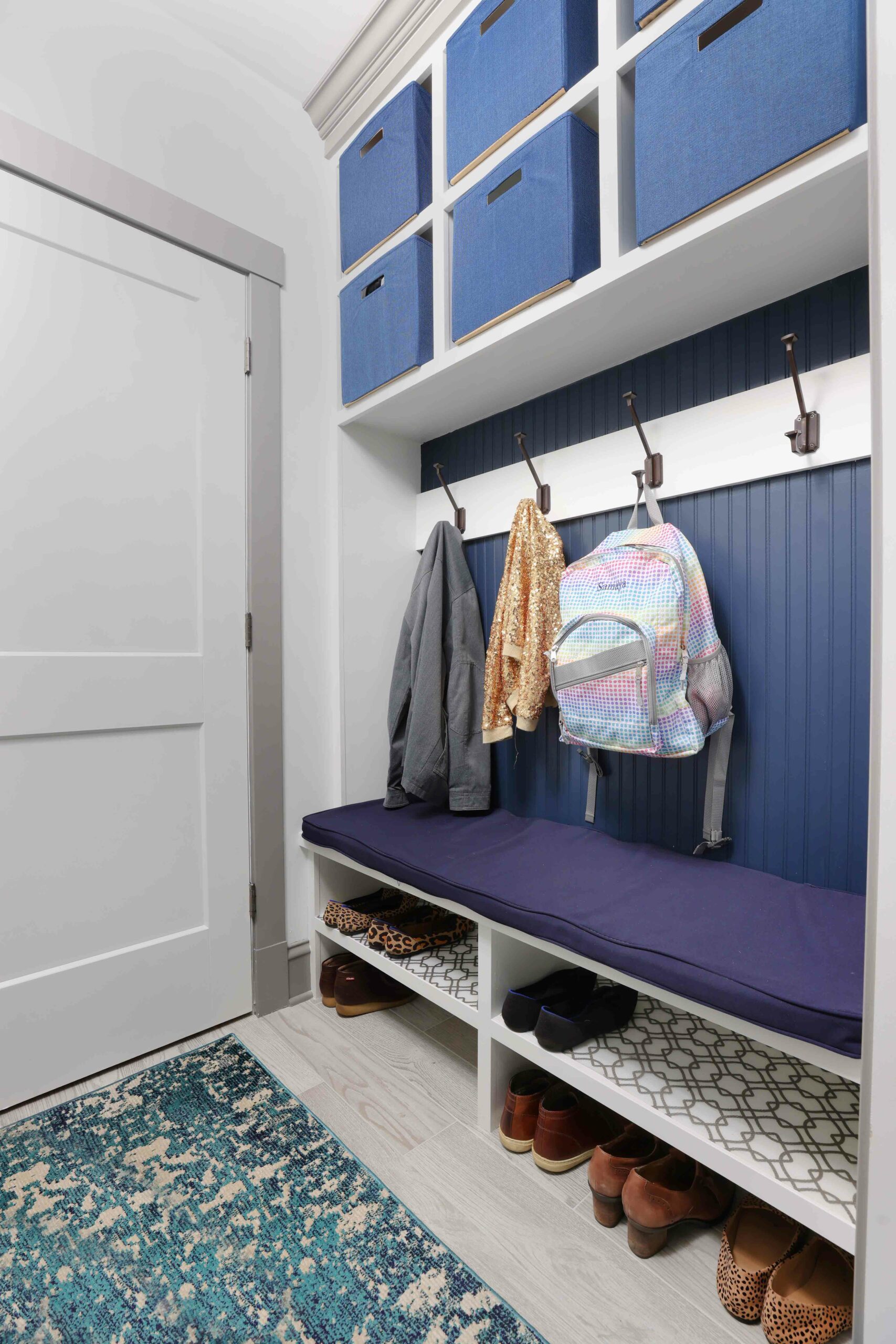 pantry/mudroom with bench and cubbies