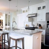 white kitchen with island seating