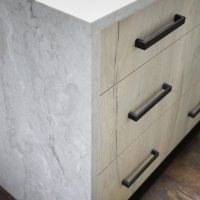 laminate cabinets close up of waterfall edge in white kitchen