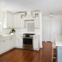 Light gray kitchen with range