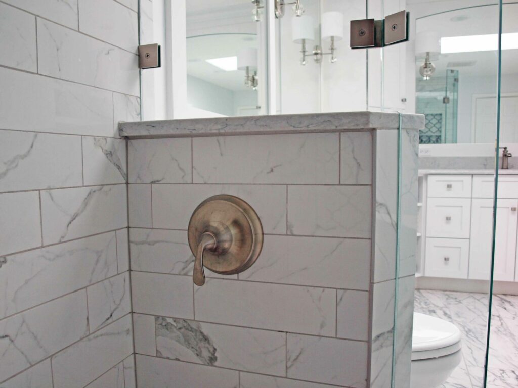 temp control just inside shower wall
