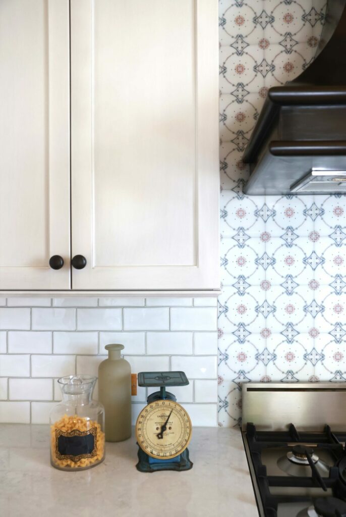 warm white kitchen cabinets and backsplash tile