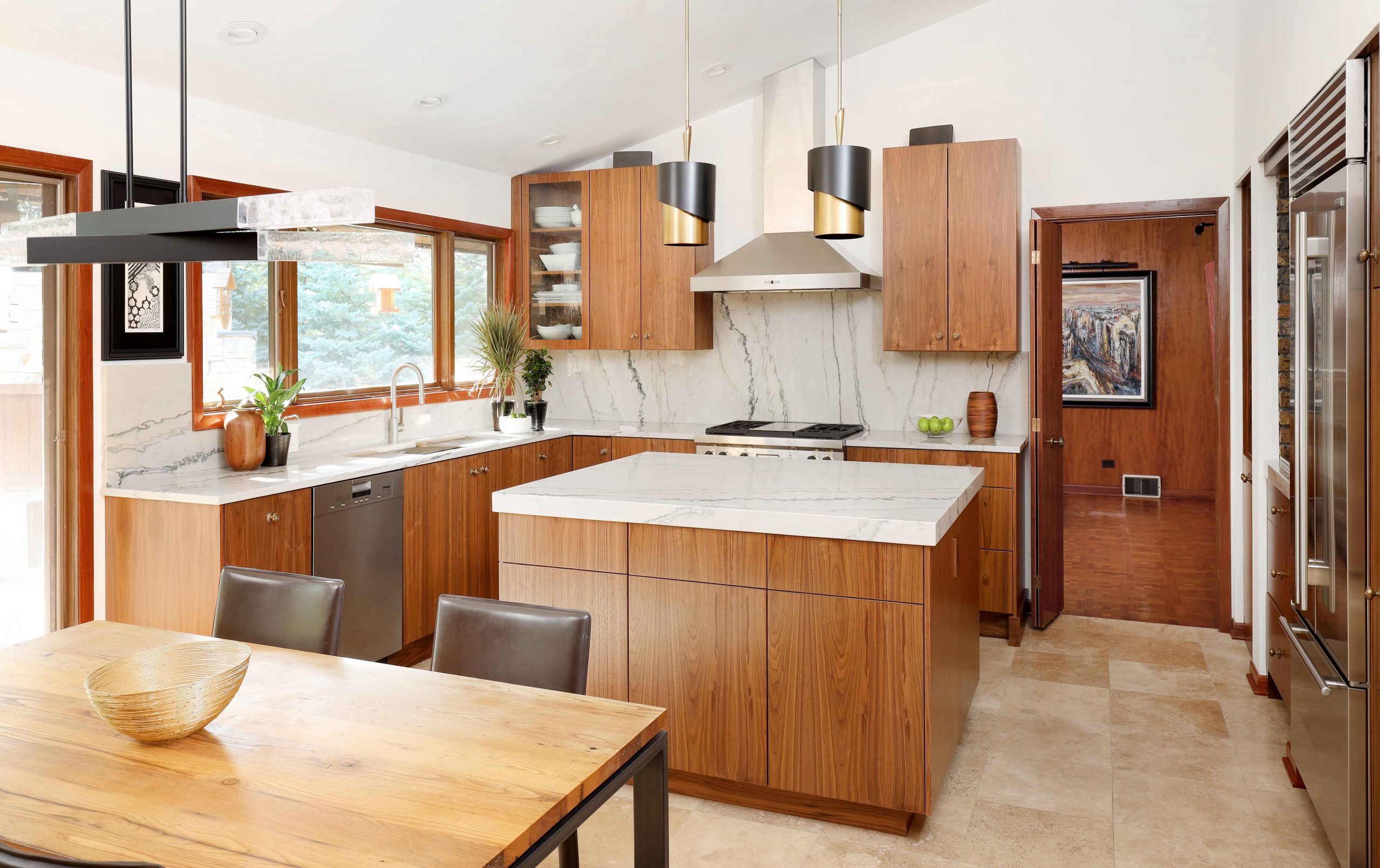 MCM kitchen with large tiled floor that transitions to hardwood