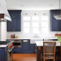 Blue and white kitchen with stained Alder island
