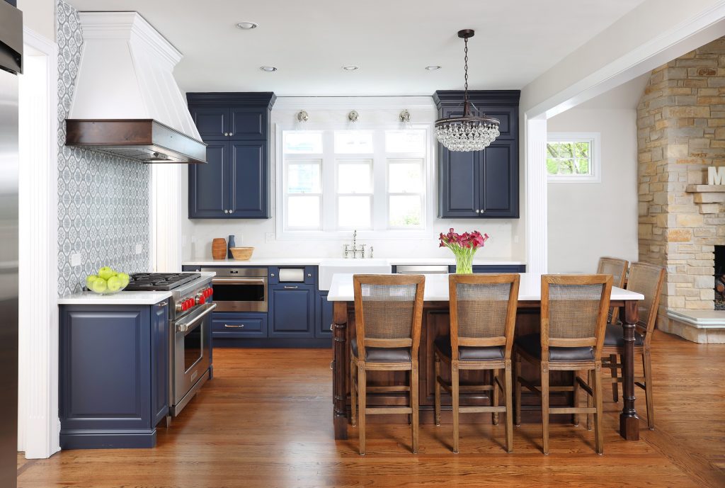 Blue and white kitchen with stained Alder island